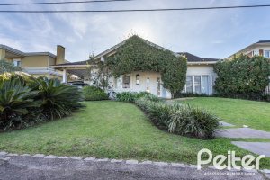 Casa em Condomínio à venda com 276m², 2 dormitórios, 2 suítes, 2 vagas, no bairro Terra Ville em PORTO ALEGRE