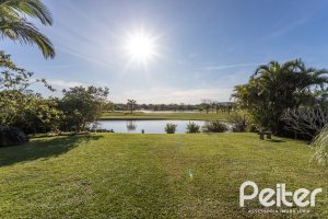 Casa em Condomínio à venda com 276m², 2 dormitórios, 2 suítes, 2 vagas, no bairro Terra Ville em PORTO ALEGRE