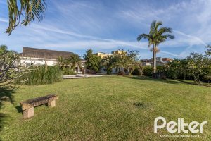 Casa em Condomínio à venda com 276m², 2 dormitórios, 2 suítes, 2 vagas, no bairro Terra Ville em PORTO ALEGRE