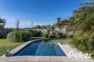 Casa em Condomínio à venda com 276m², 2 dormitórios, 2 suítes, 2 vagas, no bairro Terra Ville em PORTO ALEGRE