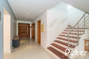 Casa em Condomínio à venda com 333m², 3 dormitórios, 3 suítes, 4 vagas, no bairro Terra Ville em PORTO ALEGRE