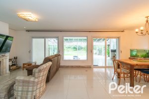 Casa em Condomínio à venda com 333m², 3 dormitórios, 3 suítes, 4 vagas, no bairro Terra Ville em PORTO ALEGRE