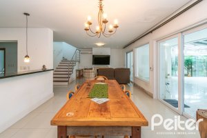 Casa em Condomínio à venda com 333m², 3 dormitórios, 3 suítes, 4 vagas, no bairro Terra Ville em PORTO ALEGRE