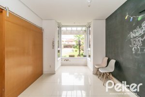 Casa em Condomínio à venda com 333m², 3 dormitórios, 3 suítes, 4 vagas, no bairro Terra Ville em PORTO ALEGRE