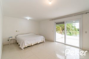 Casa em Condomínio à venda com 333m², 3 dormitórios, 3 suítes, 4 vagas, no bairro Terra Ville em PORTO ALEGRE