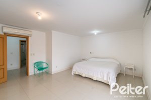 Casa em Condomínio à venda com 333m², 3 dormitórios, 3 suítes, 4 vagas, no bairro Terra Ville em PORTO ALEGRE