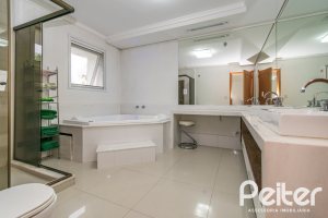 Casa em Condomínio à venda com 333m², 3 dormitórios, 3 suítes, 4 vagas, no bairro Terra Ville em PORTO ALEGRE