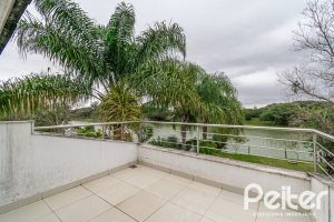 Casa em Condomínio à venda com 333m², 3 dormitórios, 3 suítes, 4 vagas, no bairro Terra Ville em PORTO ALEGRE