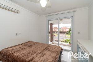 Casa em Condomínio à venda com 333m², 3 dormitórios, 3 suítes, 4 vagas, no bairro Terra Ville em PORTO ALEGRE
