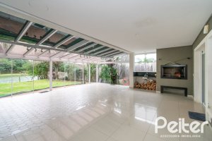 Casa em Condomínio à venda com 333m², 3 dormitórios, 3 suítes, 4 vagas, no bairro Terra Ville em PORTO ALEGRE