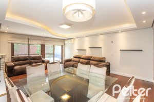 Casa em Condomínio à venda com 240m², 3 dormitórios, 1 suíte, 3 vagas, no bairro Vila Assunção em Porto Alegre