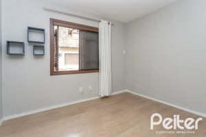 Casa em Condomínio à venda com 240m², 3 dormitórios, 1 suíte, 3 vagas, no bairro Vila Assunção em Porto Alegre