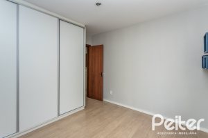 Casa em Condomínio à venda com 240m², 3 dormitórios, 1 suíte, 3 vagas, no bairro Vila Assunção em Porto Alegre