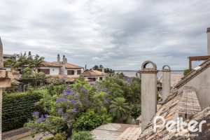 Casa em Condomínio à venda com 240m², 3 dormitórios, 1 suíte, 3 vagas, no bairro Vila Assunção em Porto Alegre