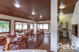 Casa em Condomínio à venda com 240m², 3 dormitórios, 1 suíte, 3 vagas, no bairro Vila Assunção em Porto Alegre