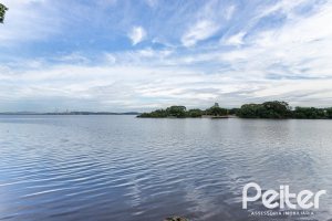 Casa em Condomínio à venda com 380m², 4 dormitórios, 2 suítes, 3 vagas, no bairro Tristeza em PORTO ALEGRE