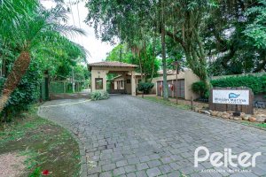 Casa em Condomínio à venda com 380m², 4 dormitórios, 2 suítes, 3 vagas, no bairro Tristeza em PORTO ALEGRE