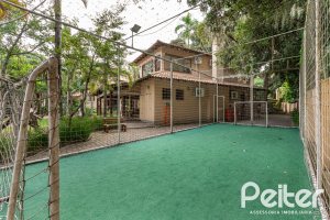 Casa em Condomínio à venda com 380m², 4 dormitórios, 2 suítes, 3 vagas, no bairro Tristeza em PORTO ALEGRE