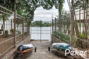 Casa em Condomínio à venda com 380m², 4 dormitórios, 2 suítes, 3 vagas, no bairro Tristeza em PORTO ALEGRE