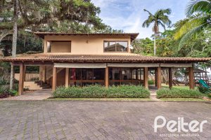 Casa em Condomínio à venda com 380m², 4 dormitórios, 2 suítes, 3 vagas, no bairro Tristeza em PORTO ALEGRE