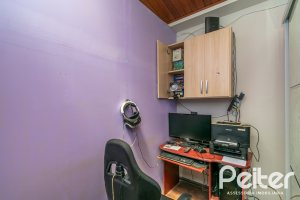 Casa à venda com 137m², 3 dormitórios, 2 vagas, no bairro Guarujá em Porto Alegre