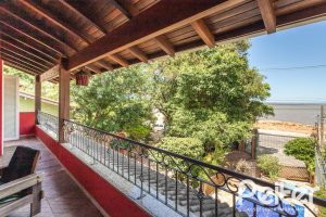 Casa à venda com 274m², 4 dormitórios, 1 suíte, 6 vagas, no bairro Ipanema em Porto Alegre