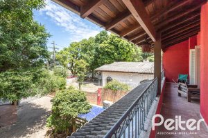 Casa à venda com 274m², 4 dormitórios, 1 suíte, 6 vagas, no bairro Ipanema em Porto Alegre