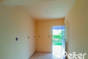 Casa à venda com 70m², 2 dormitórios, 2 vagas, no bairro Campo Novo em Porto Alegre
