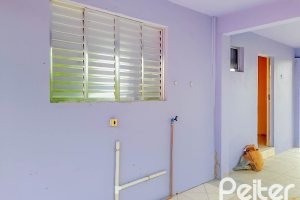 Casa à venda com 70m², 2 dormitórios, 2 vagas, no bairro Campo Novo em Porto Alegre