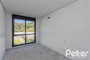 Casa à venda com 321m², 3 dormitórios, 3 suítes, 2 vagas, no bairro Vila Assunção em Porto Alegre