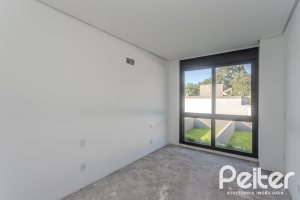 Casa à venda com 321m², 3 dormitórios, 3 suítes, 2 vagas, no bairro Vila Assunção em Porto Alegre