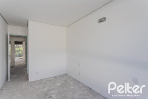Casa à venda com 321m², 3 dormitórios, 3 suítes, 2 vagas, no bairro Vila Assunção em Porto Alegre