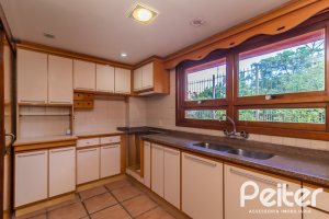 Casa em Condomínio à venda com 286m², 3 dormitórios, 1 suíte, 4 vagas, no bairro Santa Tereza em Porto Alegre