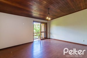 Casa em Condomínio à venda com 286m², 3 dormitórios, 1 suíte, 4 vagas, no bairro Santa Tereza em Porto Alegre