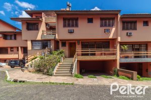 Casa em Condomínio à venda com 286m², 3 dormitórios, 1 suíte, 4 vagas, no bairro Santa Tereza em Porto Alegre