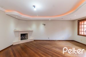 Casa em Condomínio à venda com 286m², 3 dormitórios, 1 suíte, 4 vagas, no bairro Santa Tereza em Porto Alegre