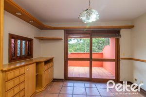 Casa em Condomínio à venda com 286m², 3 dormitórios, 1 suíte, 4 vagas, no bairro Santa Tereza em Porto Alegre