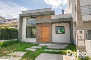 Casa em Condomínio à venda com 93m², 3 dormitórios, 1 suíte, 2 vagas, no bairro Hípica em Porto Alegre