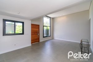 Casa em Condomínio à venda com 93m², 3 dormitórios, 1 suíte, 2 vagas, no bairro Hípica em Porto Alegre