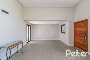 Casa em Condomínio à venda com 93m², 3 dormitórios, 1 suíte, 2 vagas, no bairro Hípica em Porto Alegre