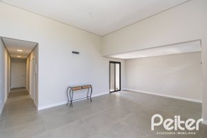 Casa em Condomínio à venda com 93m², 3 dormitórios, 1 suíte, 2 vagas, no bairro Hípica em Porto Alegre