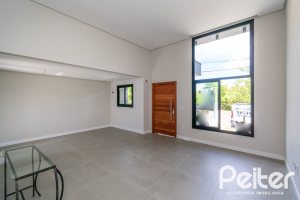 Casa em Condomínio à venda com 93m², 3 dormitórios, 1 suíte, 2 vagas, no bairro Hípica em Porto Alegre