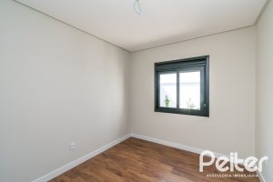 Casa em Condomínio à venda com 93m², 3 dormitórios, 1 suíte, 2 vagas, no bairro Hípica em Porto Alegre