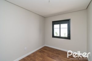 Casa em Condomínio à venda com 93m², 3 dormitórios, 1 suíte, 2 vagas, no bairro Hípica em Porto Alegre