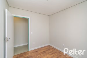 Casa em Condomínio à venda com 93m², 3 dormitórios, 1 suíte, 2 vagas, no bairro Hípica em Porto Alegre