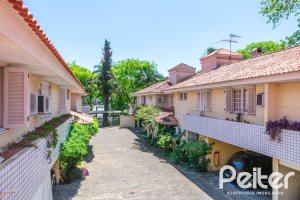 Casa em Condomínio à venda com 192m², 3 dormitórios, 2 suítes, 2 vagas, no bairro Jardim Isabel em Porto Alegre