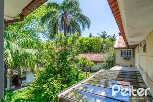 Casa em Condomínio à venda com 192m², 3 dormitórios, 2 suítes, 2 vagas, no bairro Jardim Isabel em Porto Alegre