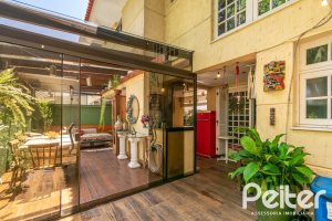 Casa em Condomínio à venda com 192m², 3 dormitórios, 2 suítes, 2 vagas, no bairro Jardim Isabel em Porto Alegre