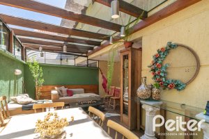 Casa em Condomínio à venda com 192m², 3 dormitórios, 2 suítes, 2 vagas, no bairro Jardim Isabel em Porto Alegre