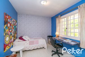 Casa em Condomínio à venda com 192m², 3 dormitórios, 2 suítes, 2 vagas, no bairro Jardim Isabel em Porto Alegre